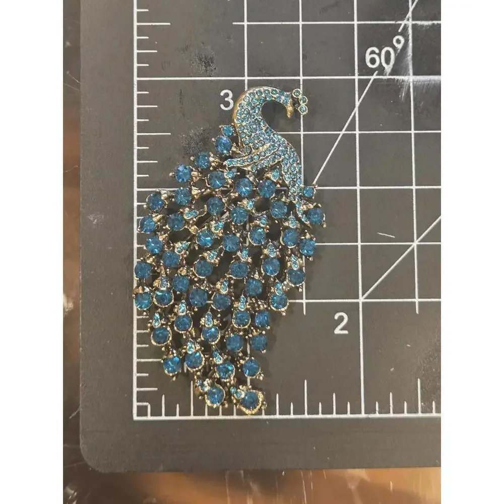 Blue green rhinestone jeweled peacock brooch